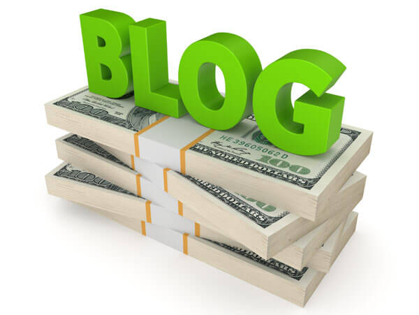 The word "blog" on top of stacks of dollars