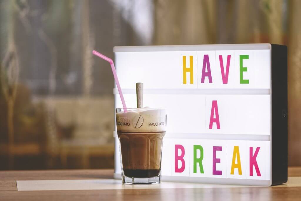 A frappe in front of "Have a Break" sign