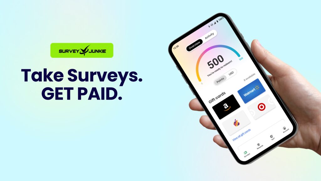 A person showing the Survey Junkie app on a smartphone beside the text "Take Surveys. GET PAID."