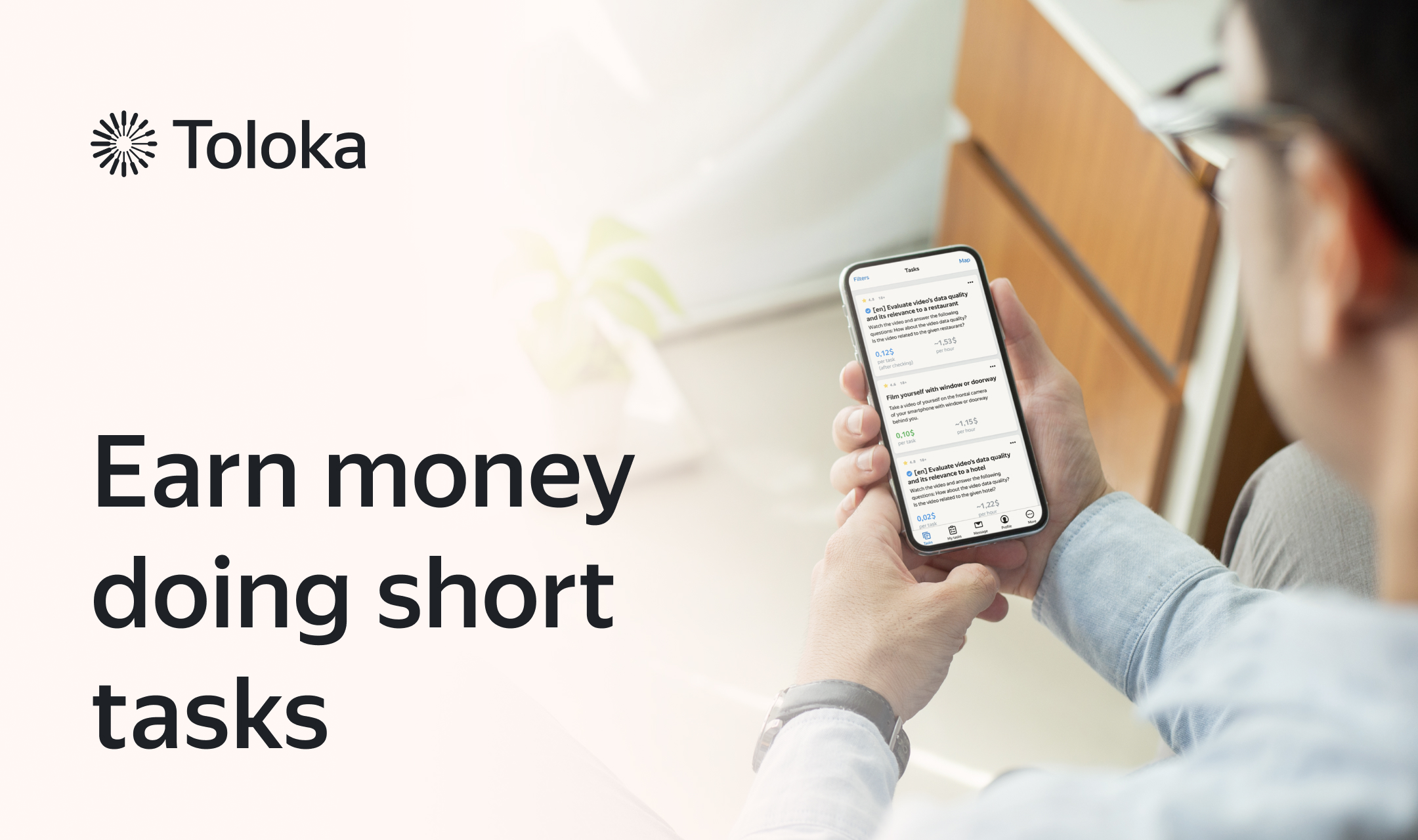 Banner showing the Toloka app on an iPad with the text "Earn money doing short tasks"